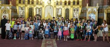 Arhiepiscopia Dunării de Jos continuă sprijinirea elevilor cu ghiozdane şi rechizite şcolare 